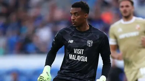 Bluebirds boss gives goalkeeper Nathan Trott '50-50' chance of being fit for match against Plymouth Argyle 