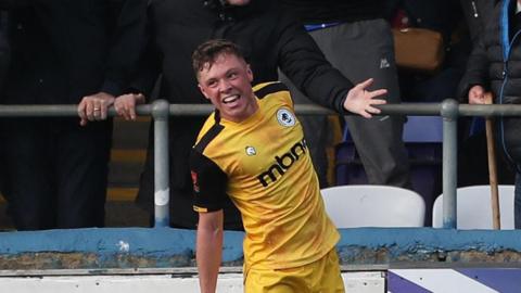 Charlie Caton celebrates scoring a goal for Chester