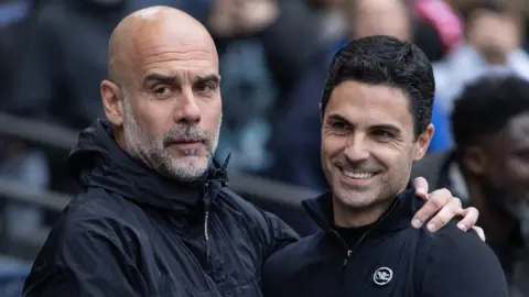 Pep Guardiola and Mikel Arteta