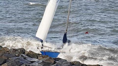 Grounded yacht