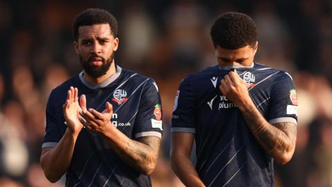 Bolton players after defeat