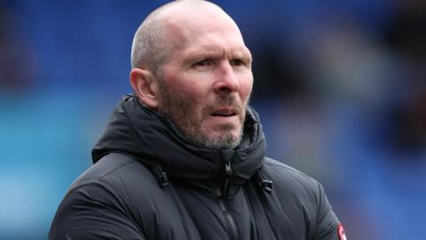 Michael Appleton looks on from the touchline