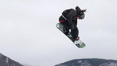 Mia Brookes competes in the women's snowboard slopestyle