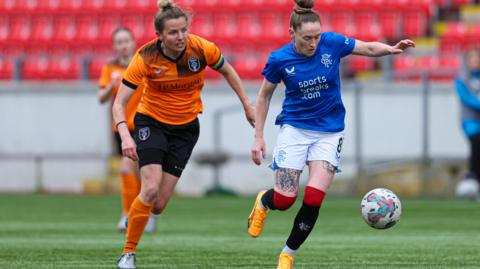 Glasgow City's Hayley Lauder (L) and Rangers' Rachel Rowe in action during a Scottish Women's Premier League match between Rangers and Glasgow City at Broadwood Stadium