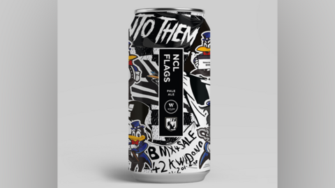 A black and white can of "NCL FLAGS" pale ale. The design features black and white words and the blue and yellow tifo bird cartoon.