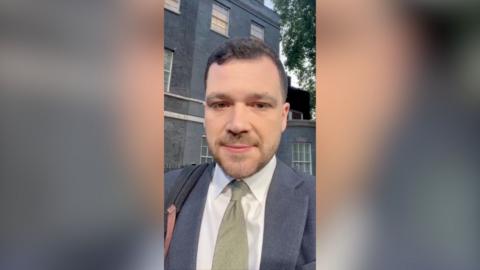 Henry Zeffman in front of Downing Street
