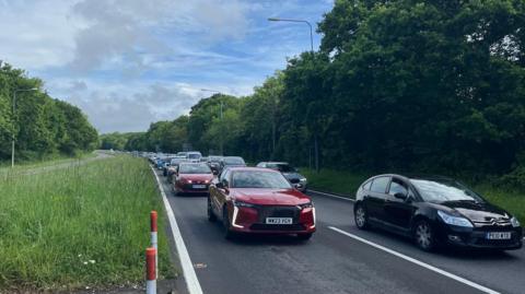 Traffic queueing on a stretch of the A22, northbound,