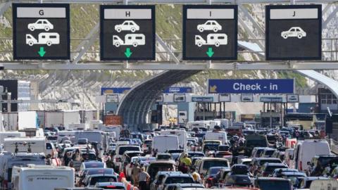 An overhead shot of queues of cars waiting at the check-in at the Port of Dover
