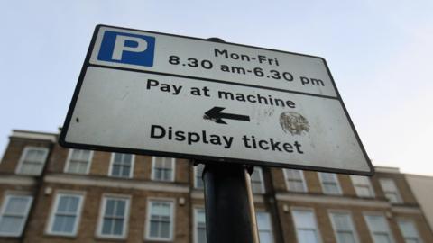 A parking information sign