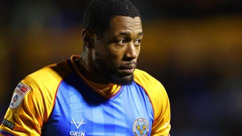 Chuks Aneke in action for Shrewsbury Town