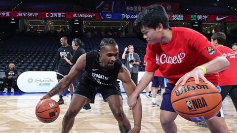 Tyson Etienne of the Brooklyn Nets plays basketball in Macau