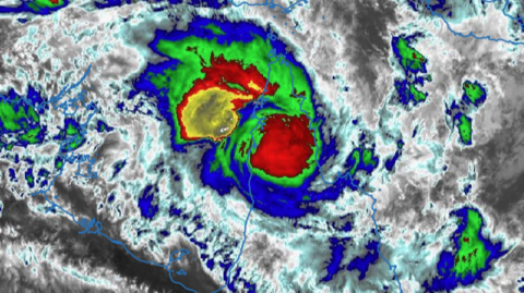 An infrared satellite image of Tropical Cyclone Narelle moving over far north Queensland.