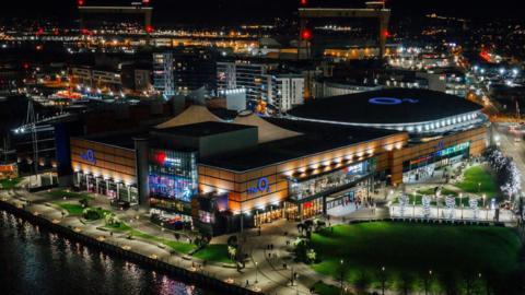 The image features a conceptual design of some of the locations where O2's logo will be displayed externally across the site, formerly known as the Odyssey complex