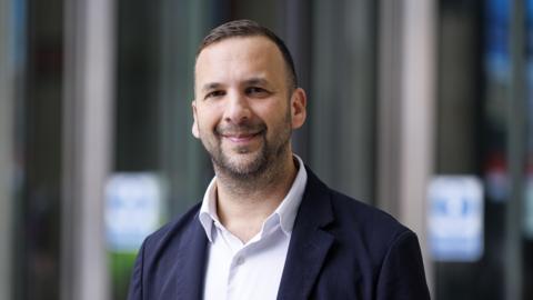 Leader of the Green Party of England and Wales, Zack Polanski, departing the BBC on 3 May.