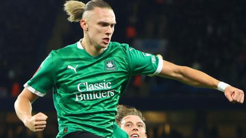 Maksym Talovierov celebrates scoring for Plymouth Argyle