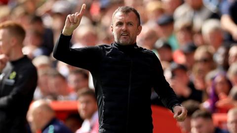 Nathan Jones pointing on the sidelines