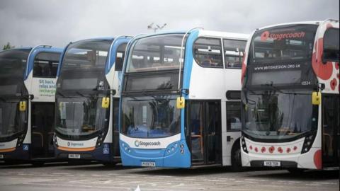 Four Stagecoach double-decker buses parked next to each other