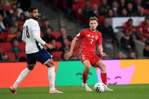 David Brooks takes on England's Ruben Loftus-Cheek at Wembley