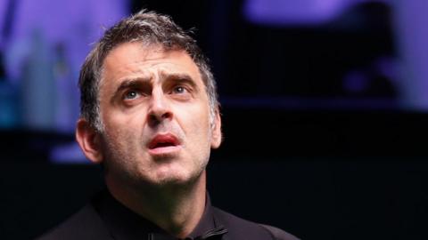 Ronnie O'Sullivan playing at the Saudi Arabia Masters