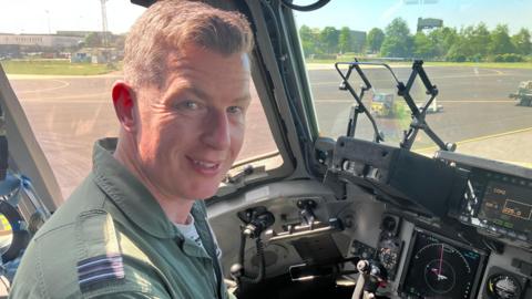 Flt Lt Mike Chandler in the cockpit of an A400 aircraft.