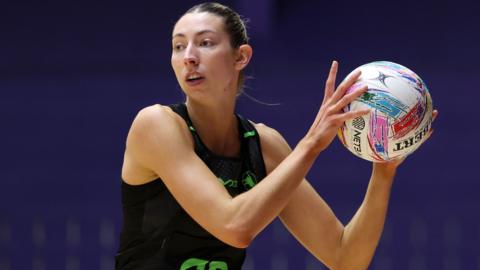 Dragons' Jacqui Newton with the ball