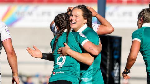 Béibhinn Parsons celebrates after scoring with Emily Lane