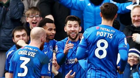 Callum Lang celebrates for Portsmouth against Coventry