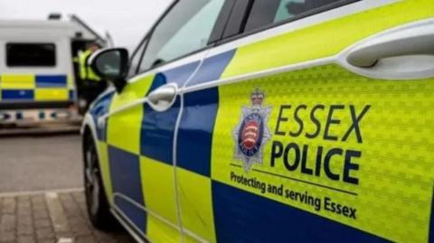 Essex Police car parked in a bay