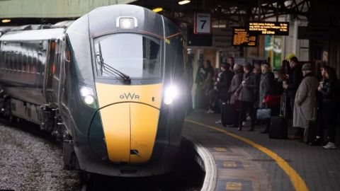 A picture shows a Great Western Railway train pulling in to Bristol Temple Meads. 