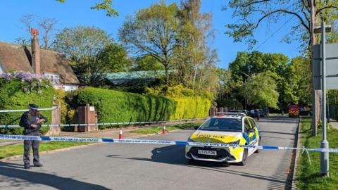 A police officer at a cordon near the Kenton United Synagogue in Harrow