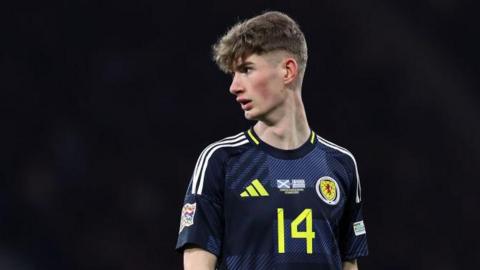 James Wilson in action for Scotland