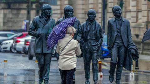 Woman in the rain