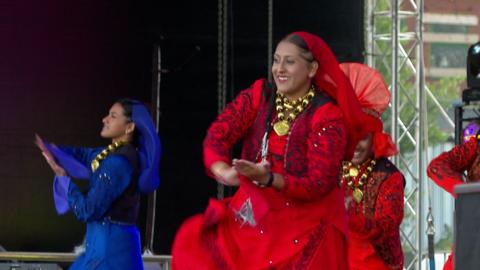 Indian lady dancer on stage in red