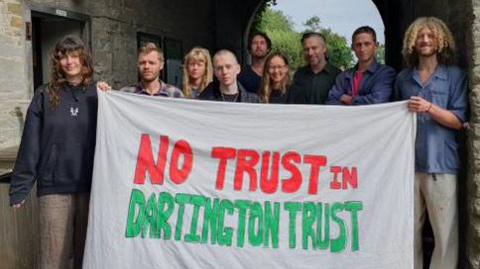 Protesters at closore of Schumacher College