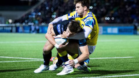 Huw Jones dives over for a try