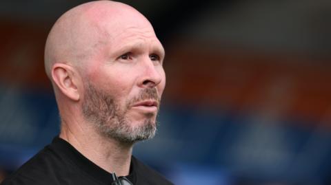 Close-up of Shrewsbury Town manager Michael Appleton on the touchline