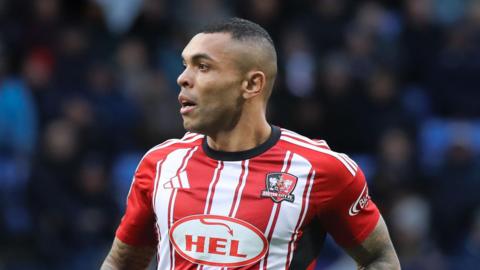 Josh Magennis playing for Exeter City last season