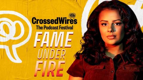 Anoushka Mutanda-Dougherty in front of Fame Under Fire logo and Crossed Wires Festival branding
