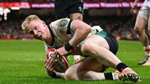 Jamie Osborne goes over for Ireland's second try against Wales on Saturday 