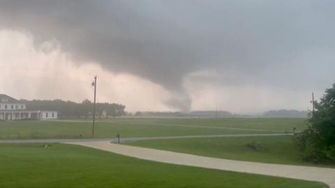 A tornado visible on the horizon
