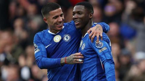 Moises Caicedo of Chelsea celebrates with Enzo Fernandez 