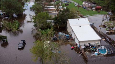 A flooded trailer park in the aftermath of Hurricane Francine, in Patterson, Louisiana