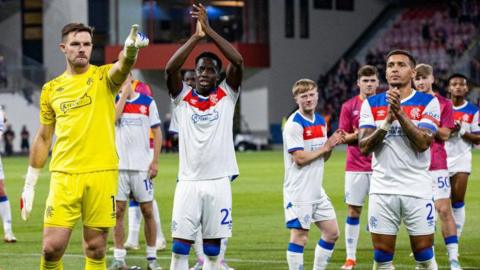 Rangers' Jack Butland, Djeidi Gassama and James Tavernier at full time during a UEFA Champions League Third Round Qualifier, Second Leg, between Viktoria Plzen and Rangers at the Doosan Arena