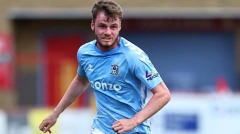 Jack Burroughs in action during a game for Coventry City