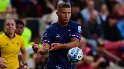 Harry Ascherl throws the ball during a match for Bristol