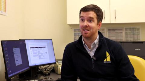 GP Alistair Headon sits in his consultation room at Whitstable Medical Practice.