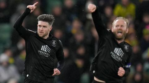 Sheffield Wednesday's Josh Windass (left) salutes to celebrate his equalising goal against Nprwich City with team-mate Barry Bannan punching the air