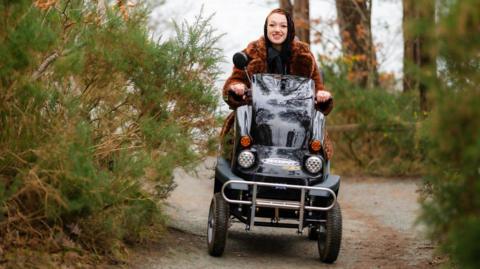 A woman riding the Tramper