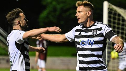 Queen's Park celebrate