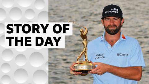 Cameron Young holds the Players Championship trophy